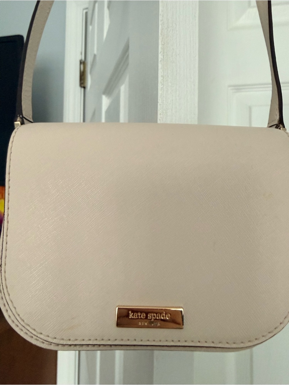 kate spade blush cream crossbody with rose gold plaque